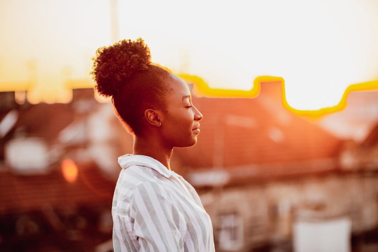 mental health tips woman at sunset