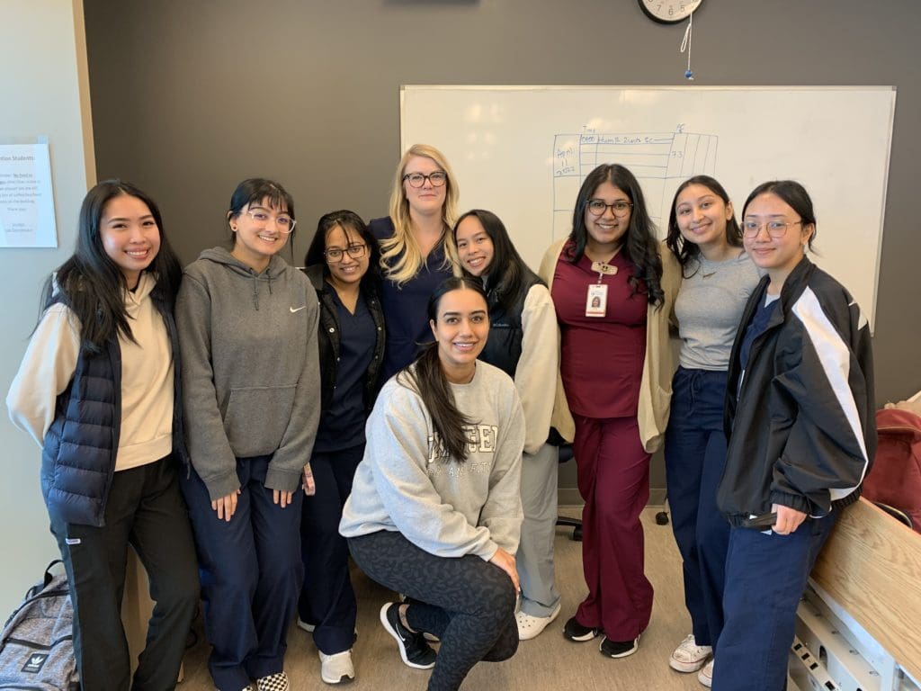 Justine with her Practical Nursing classmates.