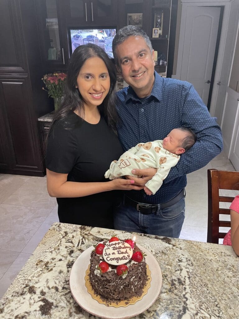 Farah Surani and her husband with their baby boy.
