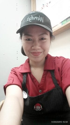 Faith at her job at Wendy's. When in Canada she worked for two years to pay for her family's tuition in the Phillippines.