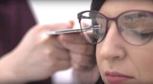 Optician measuring the Vertex Distance. Graduates of Stenberg's Licensed Optician Program get to work with patients and optometrists.